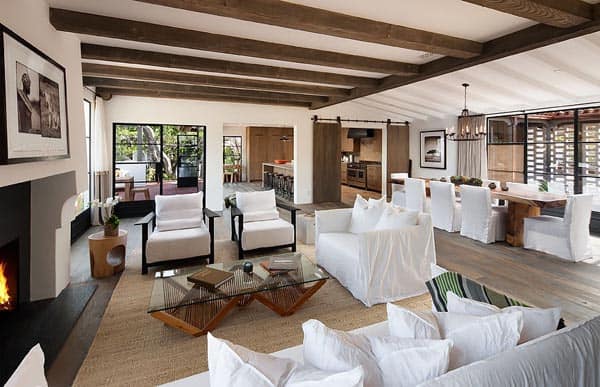 Notice the exposed beams and white stucco walls, both very common in hacienda style homes