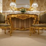 Rococo-entryway-console-table-and-armchairs-with-gold-leaf